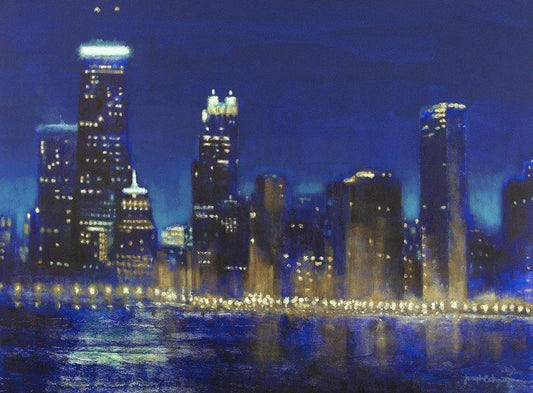 Our Chicago at night painting print on canvas captures the skyline and shoreline glowing with light.