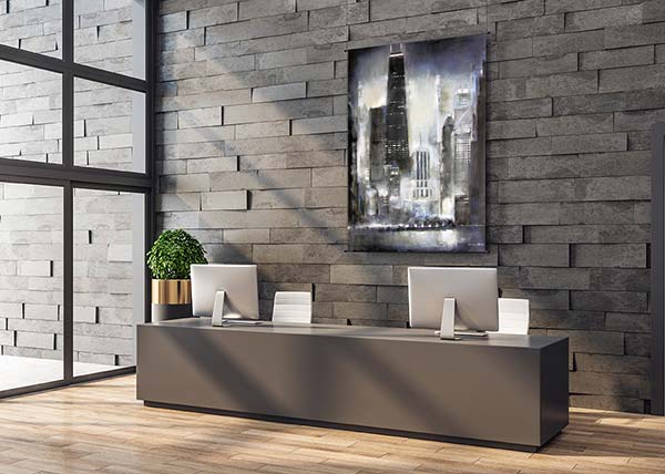 Hotel lobby with Chicago Skyline artist enhanced canvas print in soft greys and grey-blue