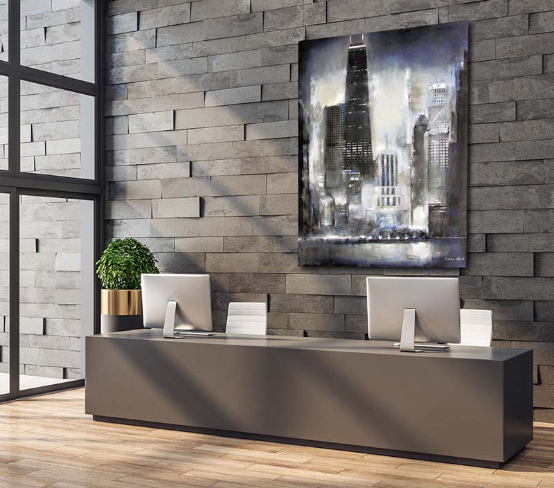 Business office with a Chicago Skyline artist enhanced canvas print in soft greys and grey-blue.