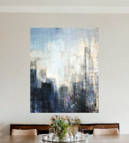Abstract painting of cityscape on a wall above a dining table.